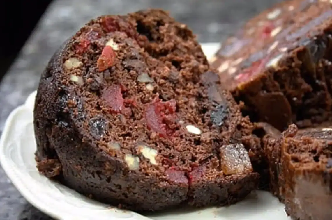 Chocolate Fruit Cake with Brandy Syrup - Saffarazzi Slice of chocolate fruit cake with dried fruit and brandy syrup.