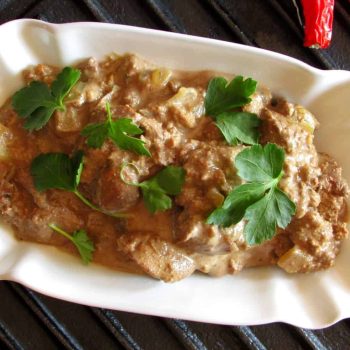 Chicken Livers Fried in Creamy Garlic Sauce and Served with Bread