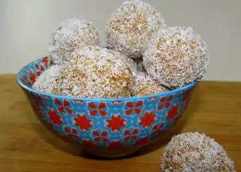 Balls of Caramel, Cream and Vanilla Cake Rolled in Coconut