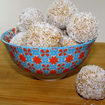 Balls of Caramel, Cream and Vanilla Cake Rolled in Coconut