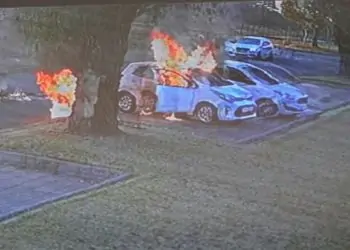 Mother and car set alight outside pre-school