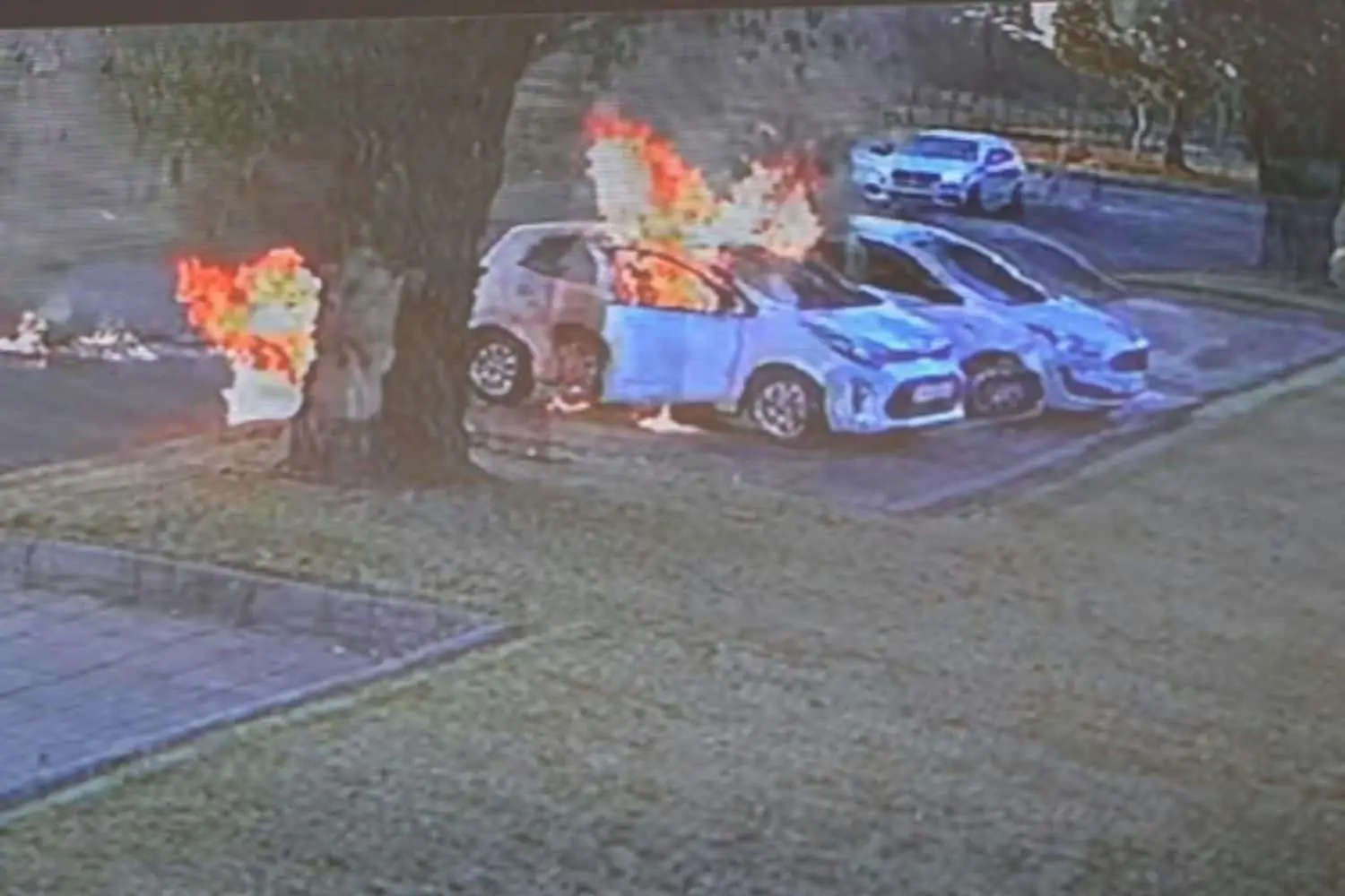 Mother and car set alight outside pre-school
