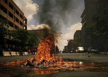 pawel-janiak-49LBMXrY5BE-unsplash (2) burning tyres road protest unrest.jpg