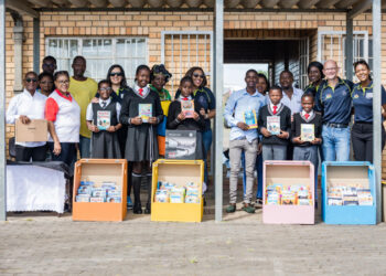 MBSA and Rally to Read representatives handing over the educational material donations.jpg