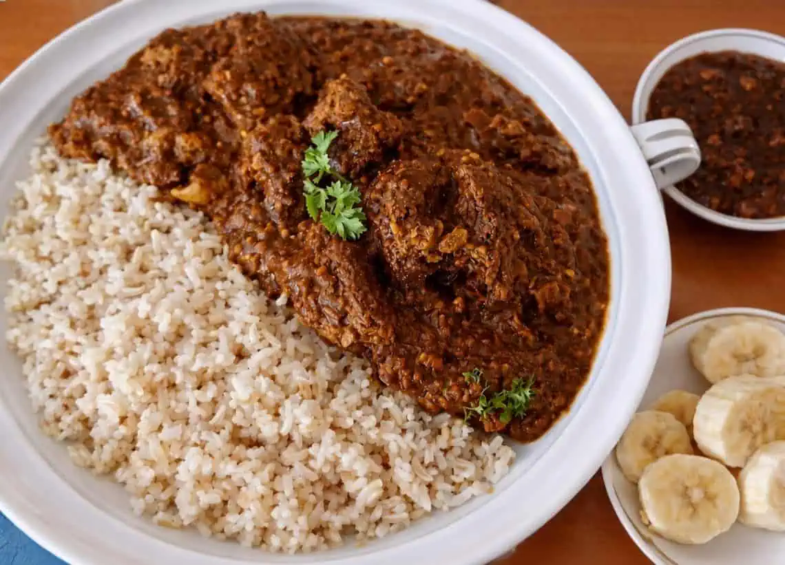 Slow-Simmered Spicy Beef Curry with Chutney & Coconut - Saffarazzi Slow-Simmered Spicy Beef Curry with Chutney & Coconut