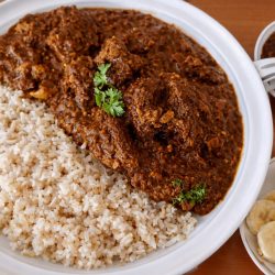 Slow-Simmered Spicy Beef Curry with Chutney & Coconut - Saffarazzi Slow-Simmered Spicy Beef Curry with Chutney & Coconut