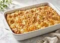 Coconut Bread and Butter Pudding - Saffarazzi Coconut bread and butter pudding topped with golden meringue and cinnamon