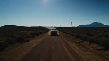 Ford bakkie kicking up dust on a rural road - Saffarazzi Ford bakkie kicking up dust on a rural road