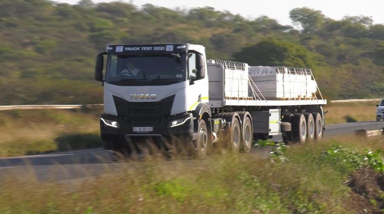 Iveco T-Way hauling bricks on flatbed trailer - Saffarazzi Iveco T-Way hauling bricks on flatbed trailer