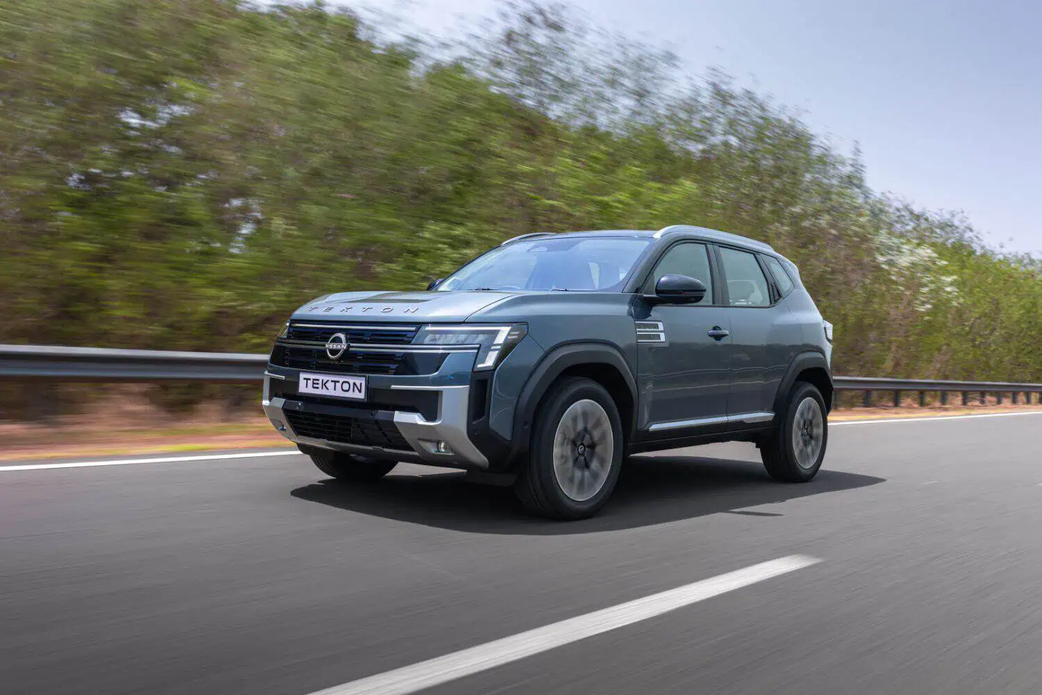 Nissan Tekton compact SUV driving on highway - Saffarazzi Nissan Tekton compact SUV driving on highway