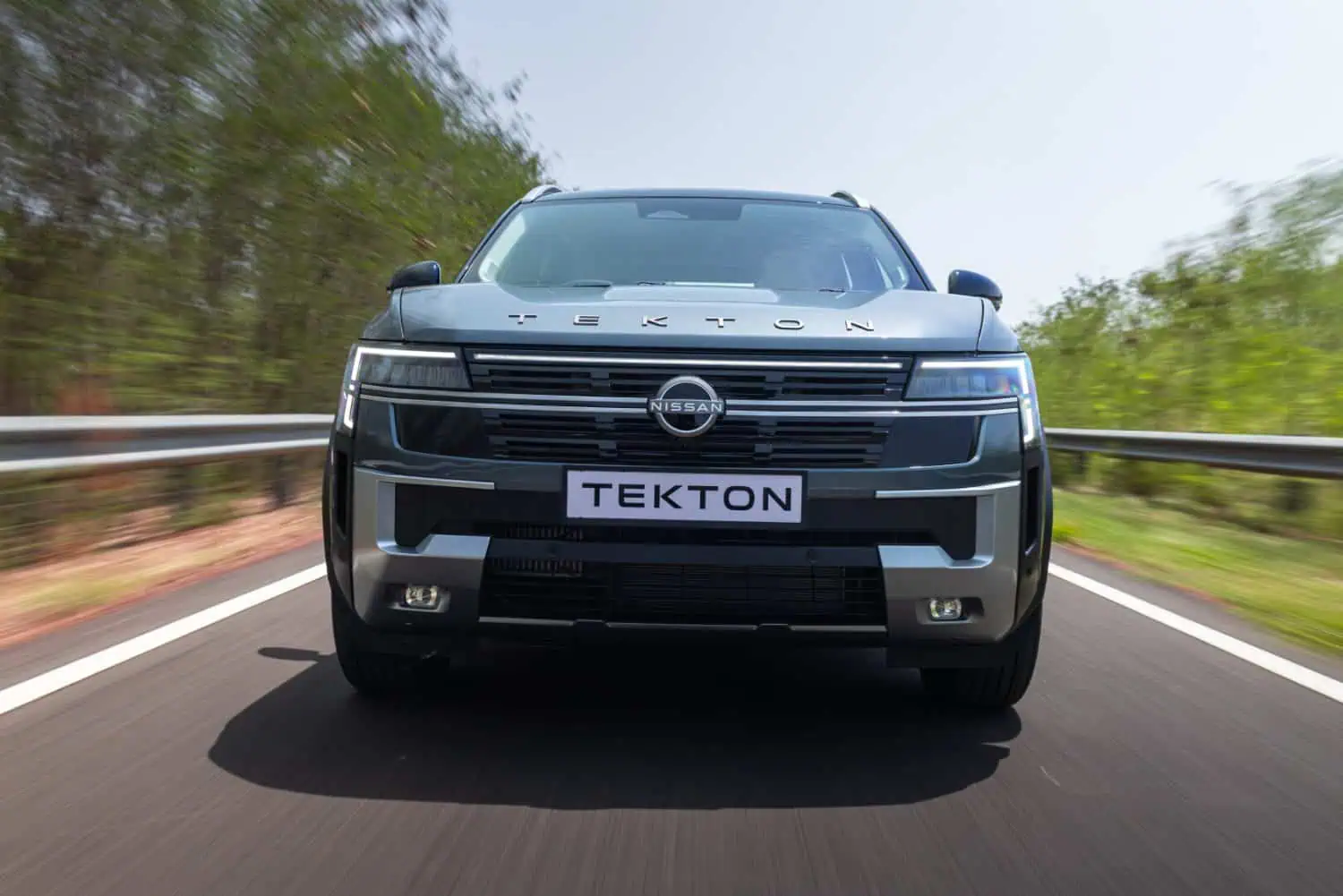 Nissan Tekton compact SUV front view on road - Saffarazzi Nissan Tekton compact SUV front view on road