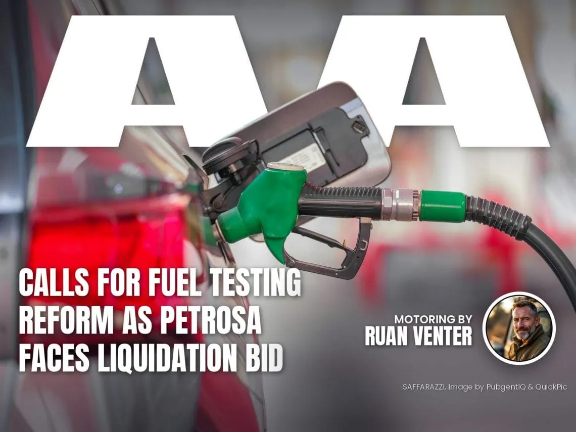 Green fuel nozzle refuelling a car at a filling station