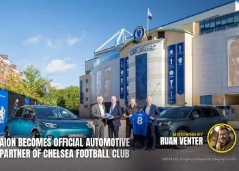 AION executives and two cars outside Stamford Bridge