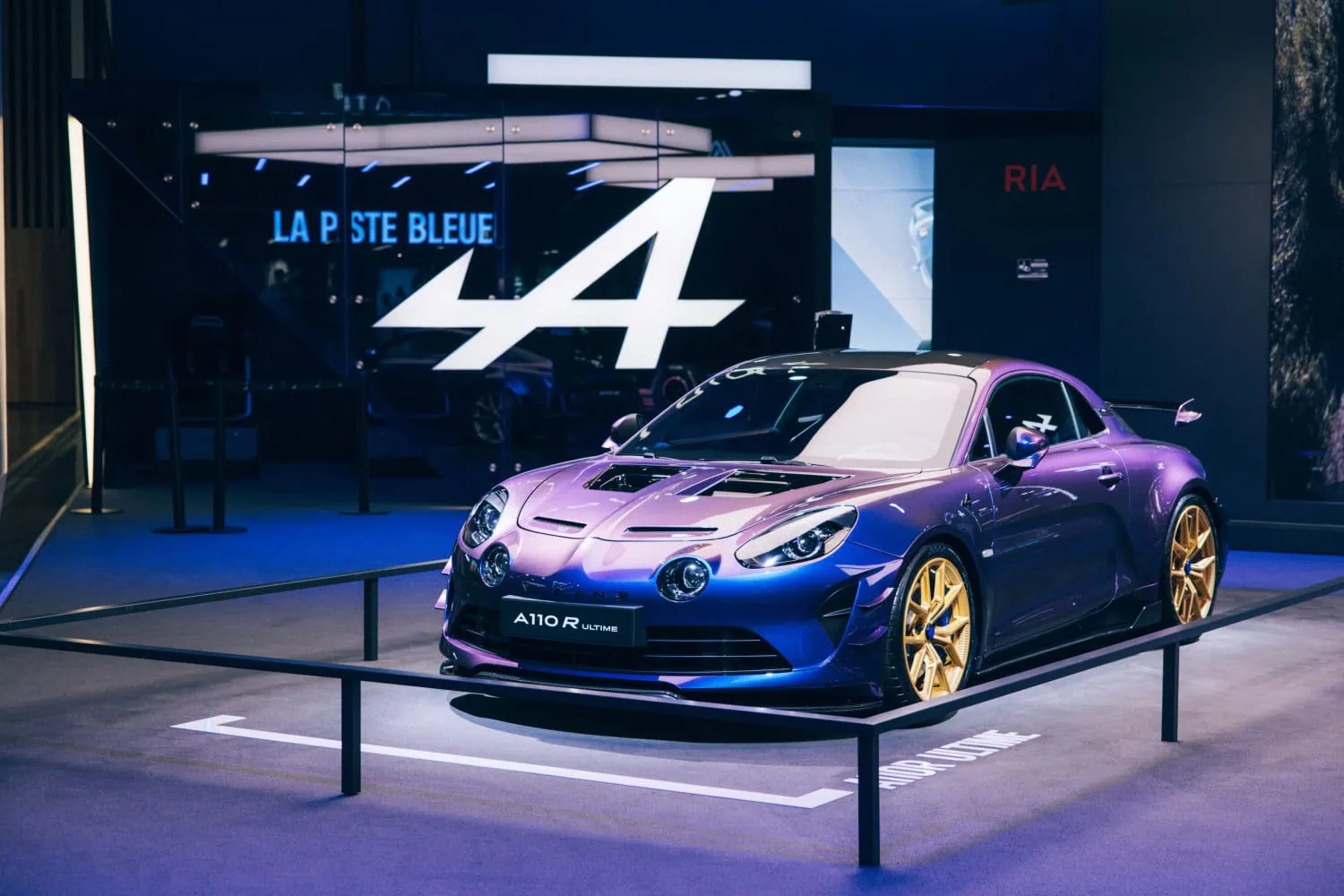 Purple Alpine A110 R Ultime - Saffarazzi Alpine A110 R Ultime in purple with gold wheels.