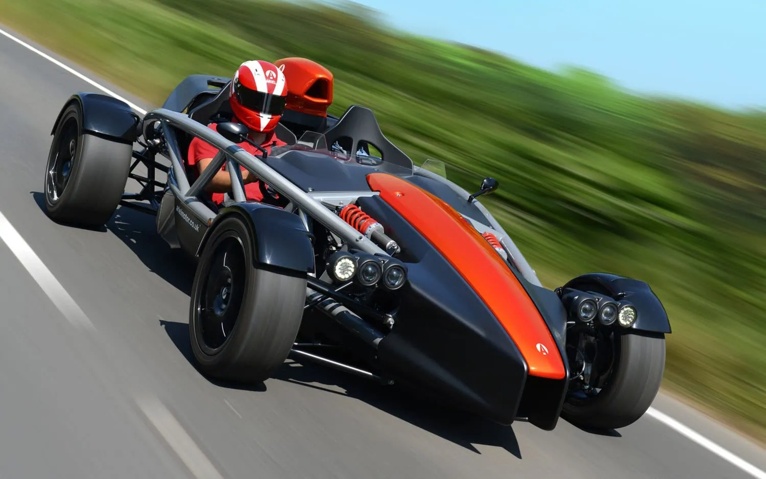 Ariel Atom on road - Saffarazzi Ariel Atom driving on a country road.