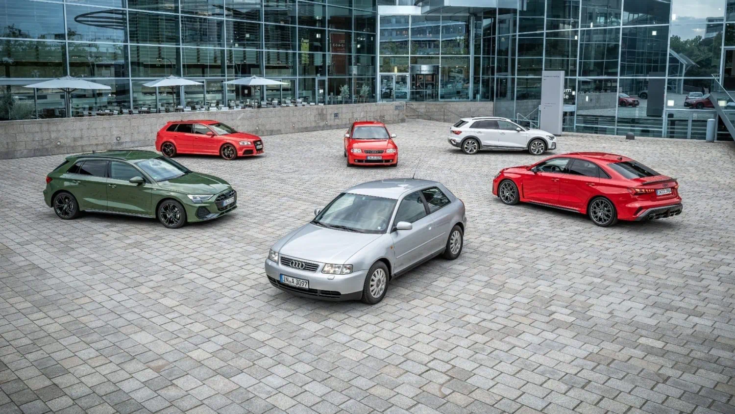 Audi A3 family across generations parked on cobblestones - Saffarazzi Audi A3 family across generations parked on cobblestones