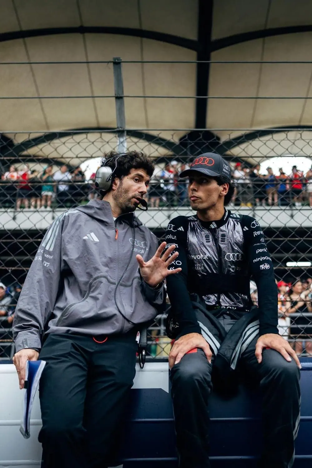 Audi Revolut F1 Team driver and engineer on grid - Saffarazzi Audi Revolut F1 Team driver and engineer on grid