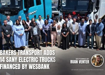 Sany magazine cover: Bakers Transport adds 14 electric trucks financed by WesBank, with the writer's by-line.