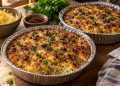 Golden crustless biltong and cheese tart in aluminium dishes, image supplied by Irene Muller and created using AI