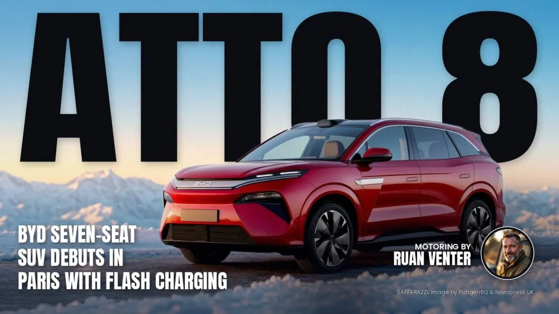BYD ATTO 8 front three-quarter view in snowy mountains