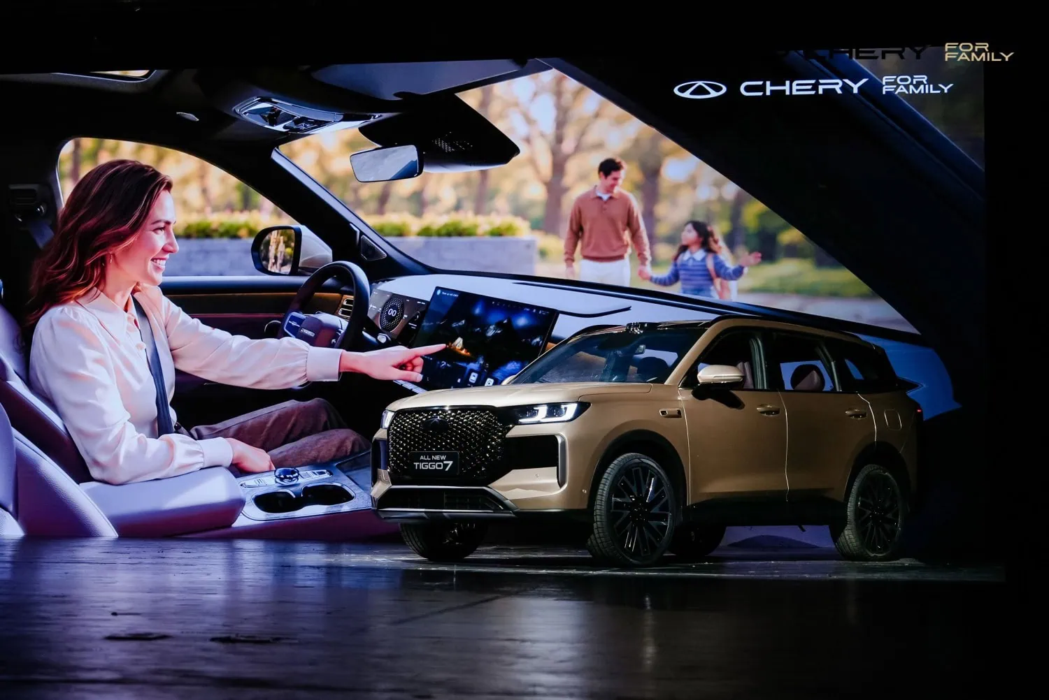 Tiggo 7 at launch event - Saffarazzi Chery Tiggo 7 on stage with interior screen backdrop.