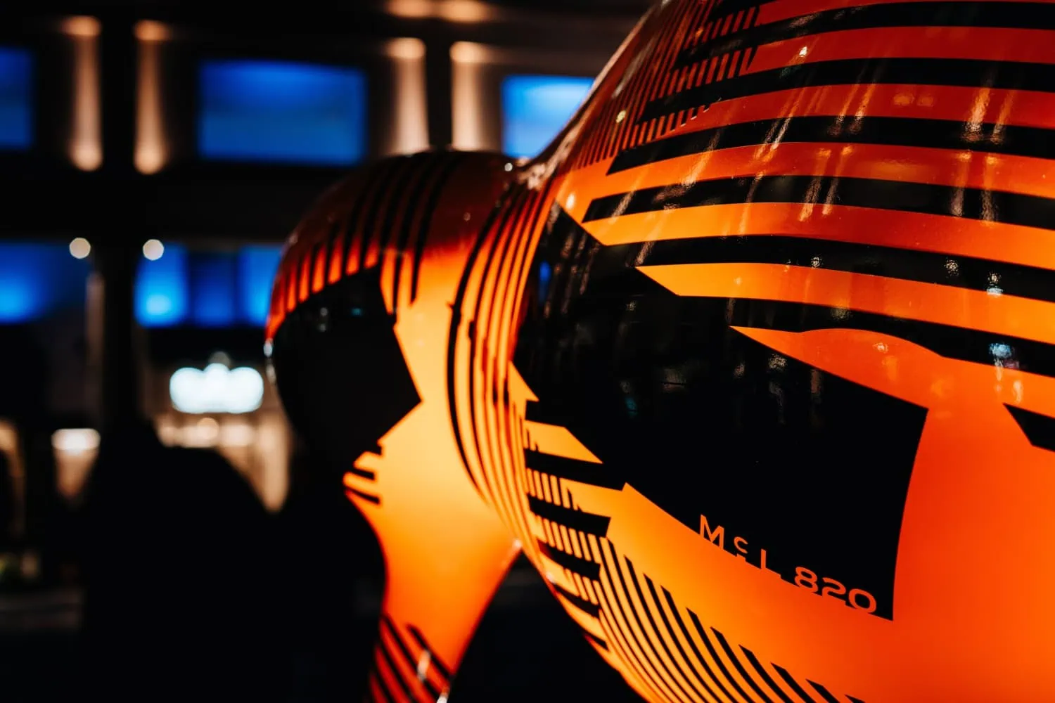 McLaren kiwi sculpture livery detail - Saffarazzi Close-up of McLaren McL 820 kiwi sculpture livery.