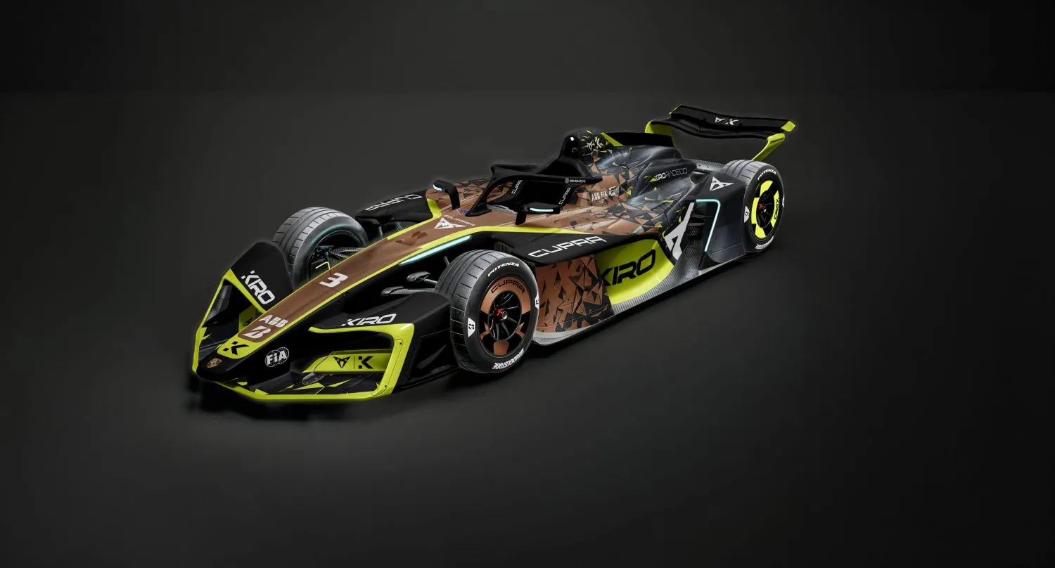 CUPRA KIRO Formula E race car livery - Saffarazzi Formula-style race car with black, yellow, and geometric brown livery, shown from front-left in a dark studio. Recreates a high-performance racing concept.