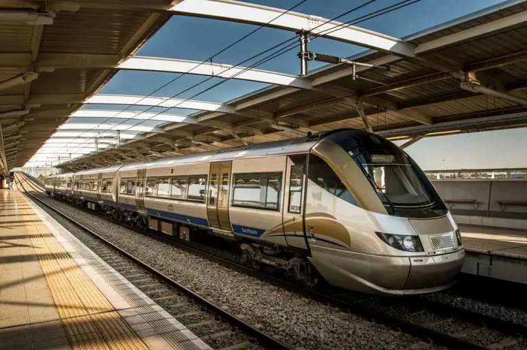Gautrain at station platform - Saffarazzi Gautrain train standing at a covered station platform.
