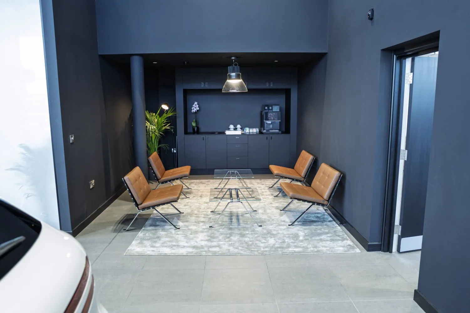 Genesis press photo 5 - Saffarazzi Genesis Leeds customer lounge with leather chairs.