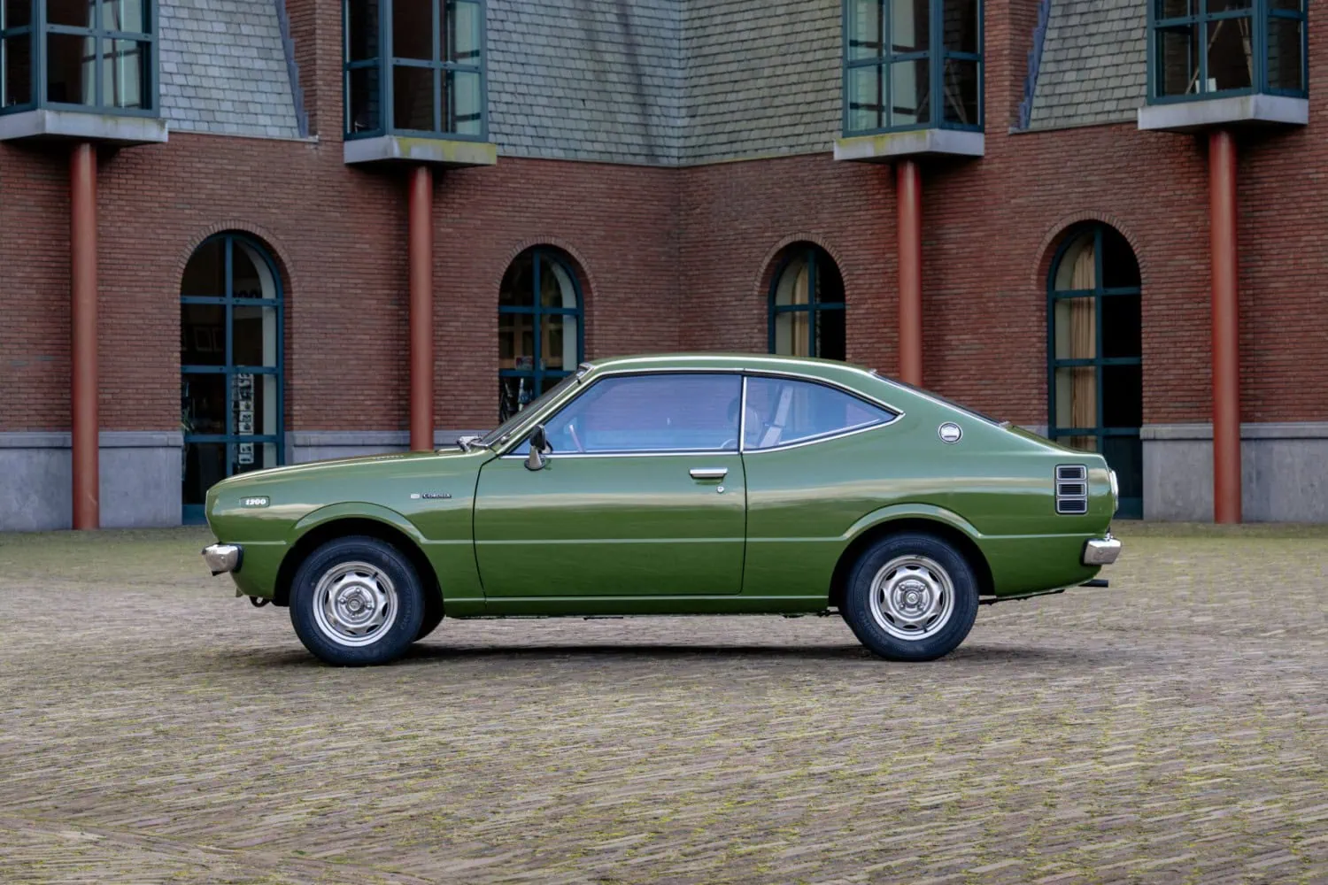 Green Corolla coupe profile - Saffarazzi Green Toyota Corolla coupe side profile.