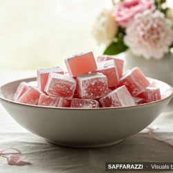 Homemade Turkish Delight – Pink Rosewater Sweets - Saffarazzi Pink rosewater Turkish delight squares coated in icing sugar, served as homemade sweets