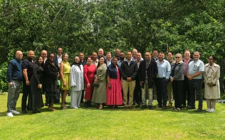 Honourees group on lawn - Saffarazzi Hyundai Cape Town long service honourees group outdoors.