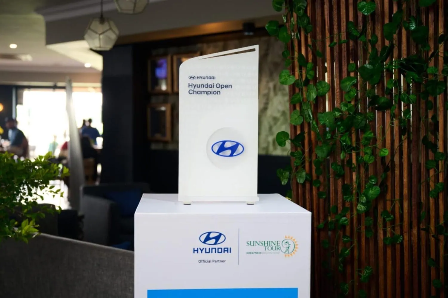 Hyundai Open Champion trophy on Sunshine Tour plinth - Saffarazzi Hyundai Open Champion trophy on Sunshine Tour plinth