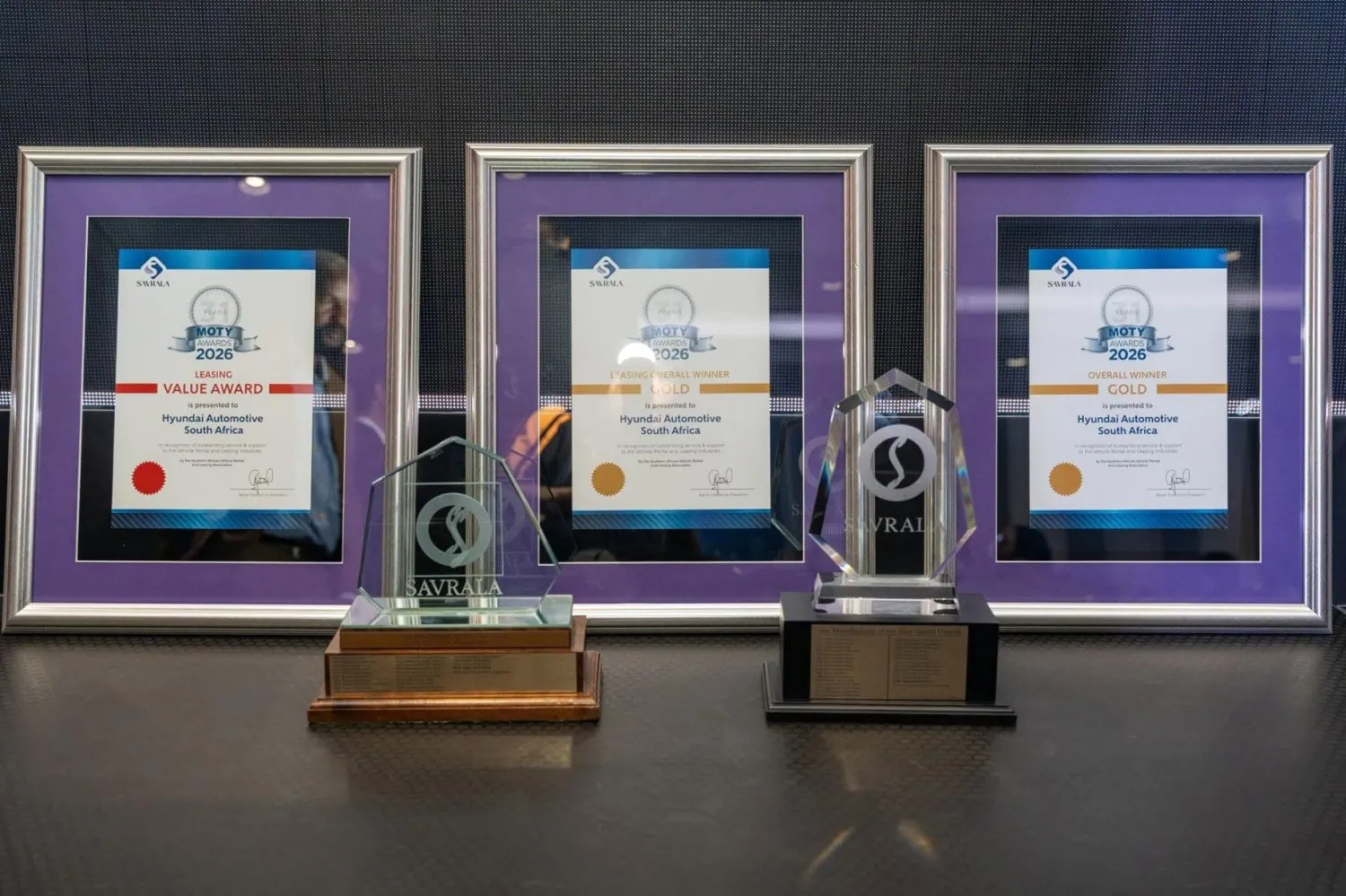 SAVRALA award certificates and trophies - Saffarazzi Hyundai SAVRALA MOTY 2026 certificates and trophies displayed.