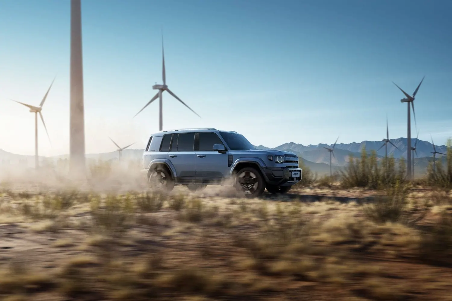 iCAUR V27 driving off road past wind turbines - Saffarazzi iCAUR V27 driving off road past wind turbines