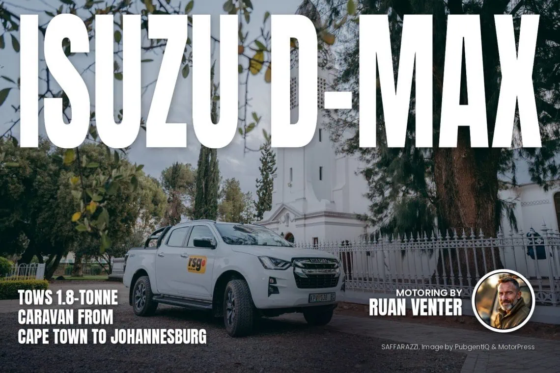 Isuzu D-Max double cab parked beside a white church