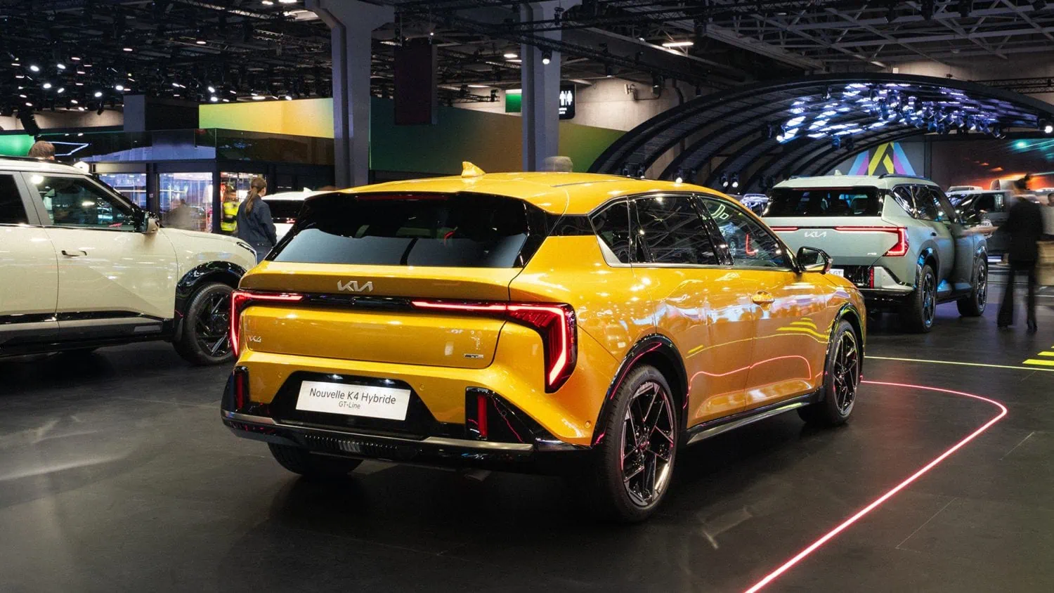 Kia K4 Hybrid rear three-quarter view at Paris - Saffarazzi Kia K4 Hybrid rear three-quarter view at Paris