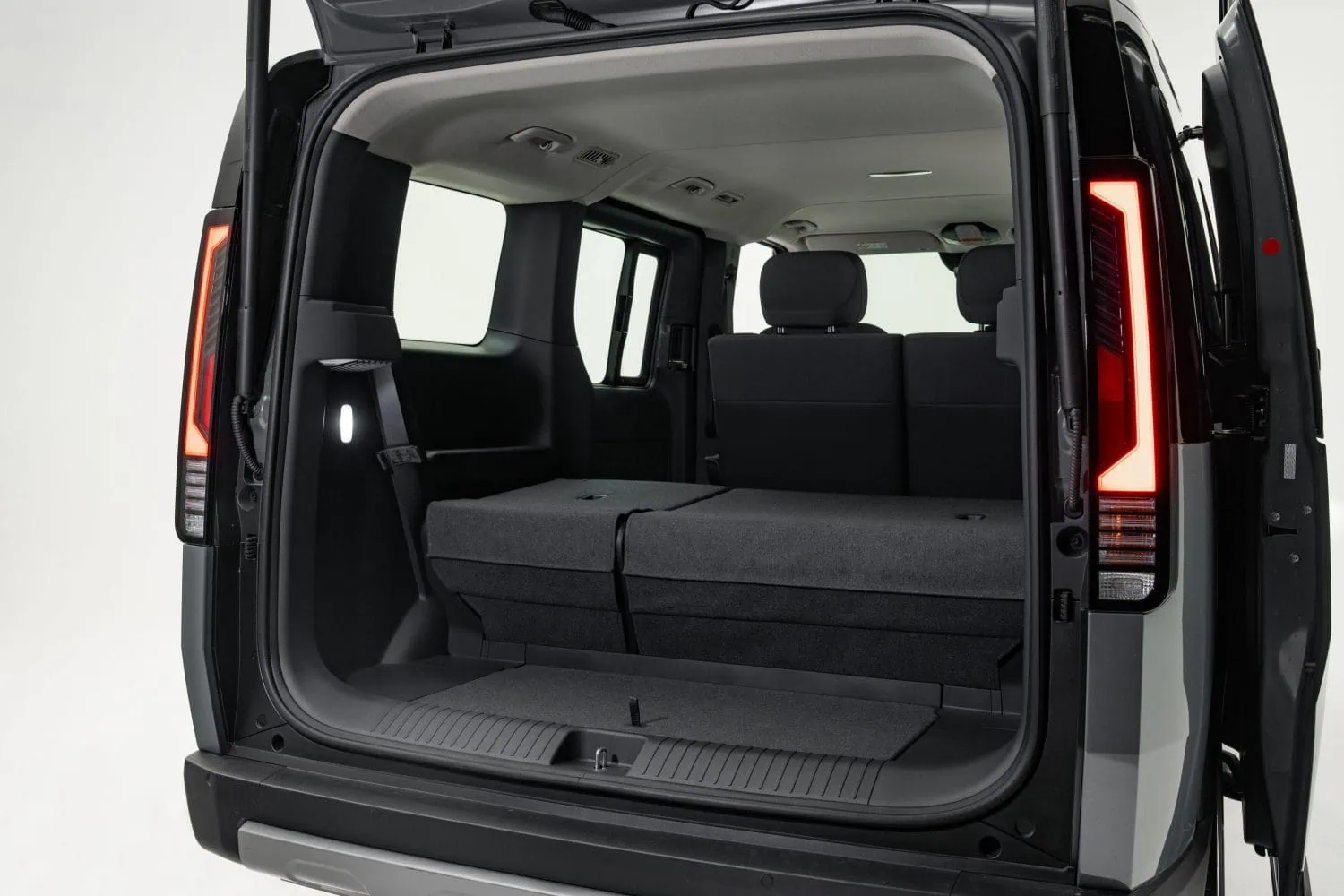 Kia PV5 Passenger boot with rear seats folded - Saffarazzi Kia PV5 Passenger boot with rear seats folded