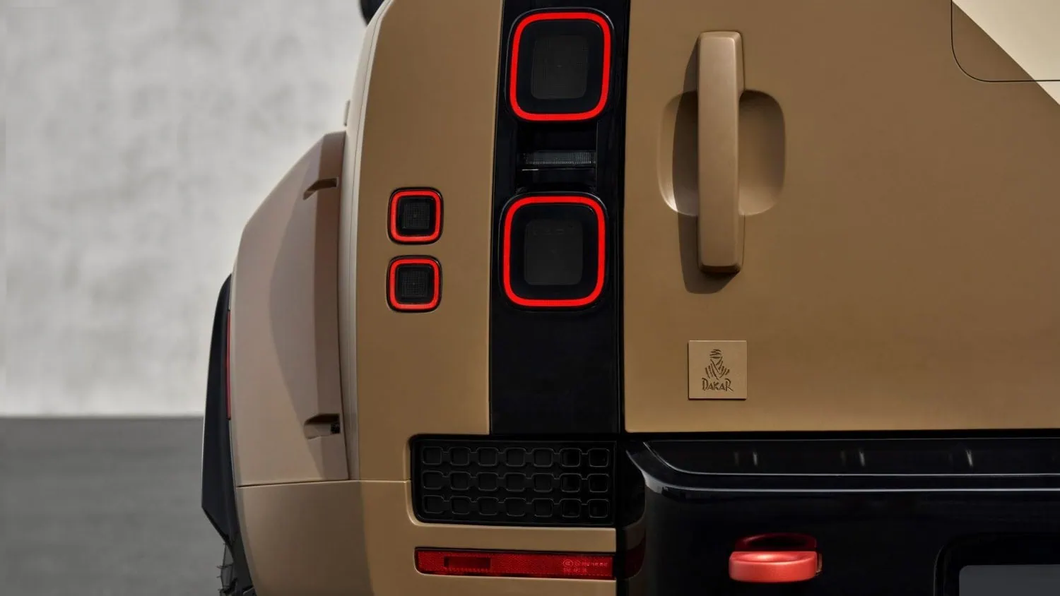 Land Rover Defender rear light and Dakar badge detail - Saffarazzi Land Rover Defender rear light and Dakar badge detail