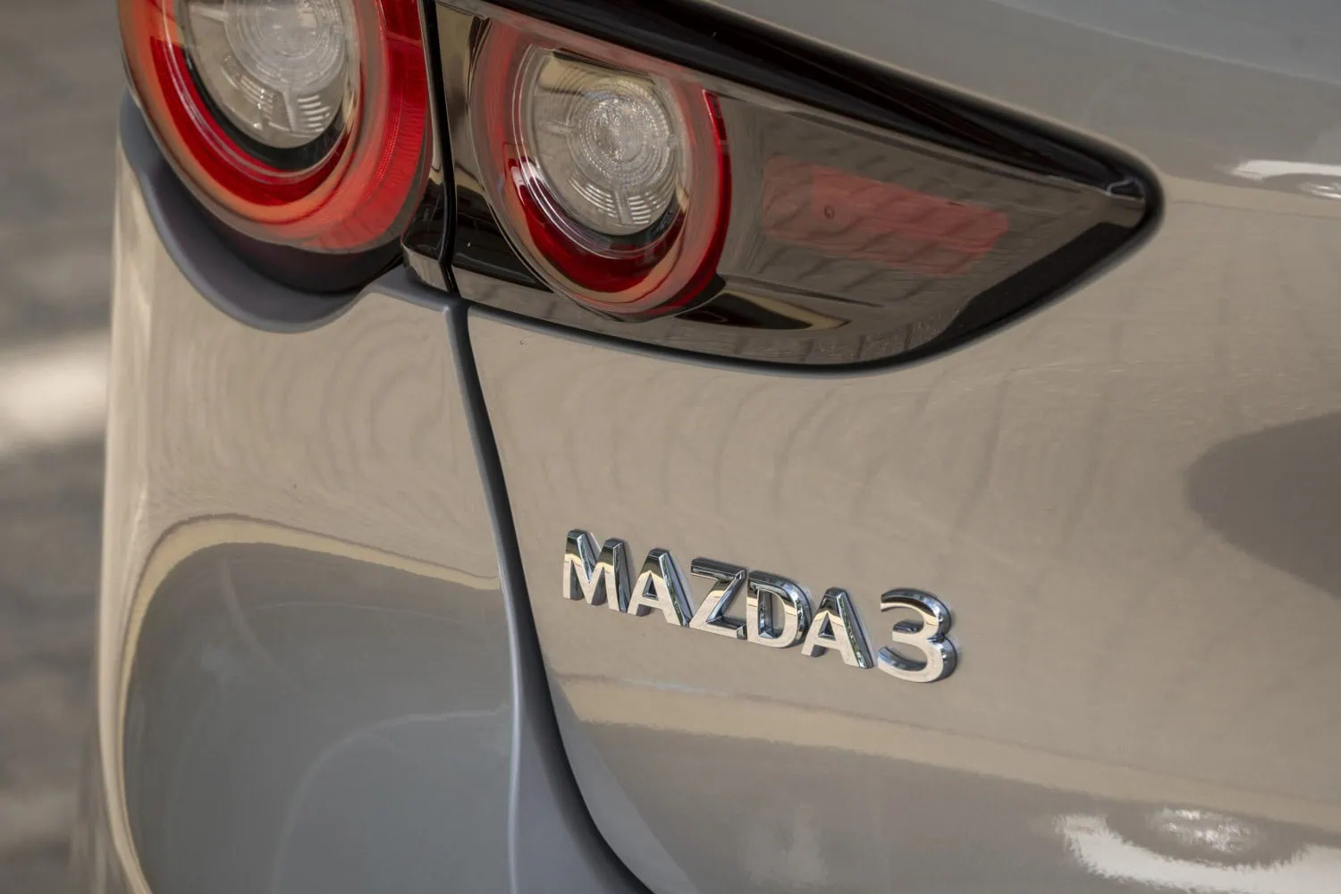 Mazda3 tailgate badge - Saffarazzi Mazda3 badge and rear light on tailgate.