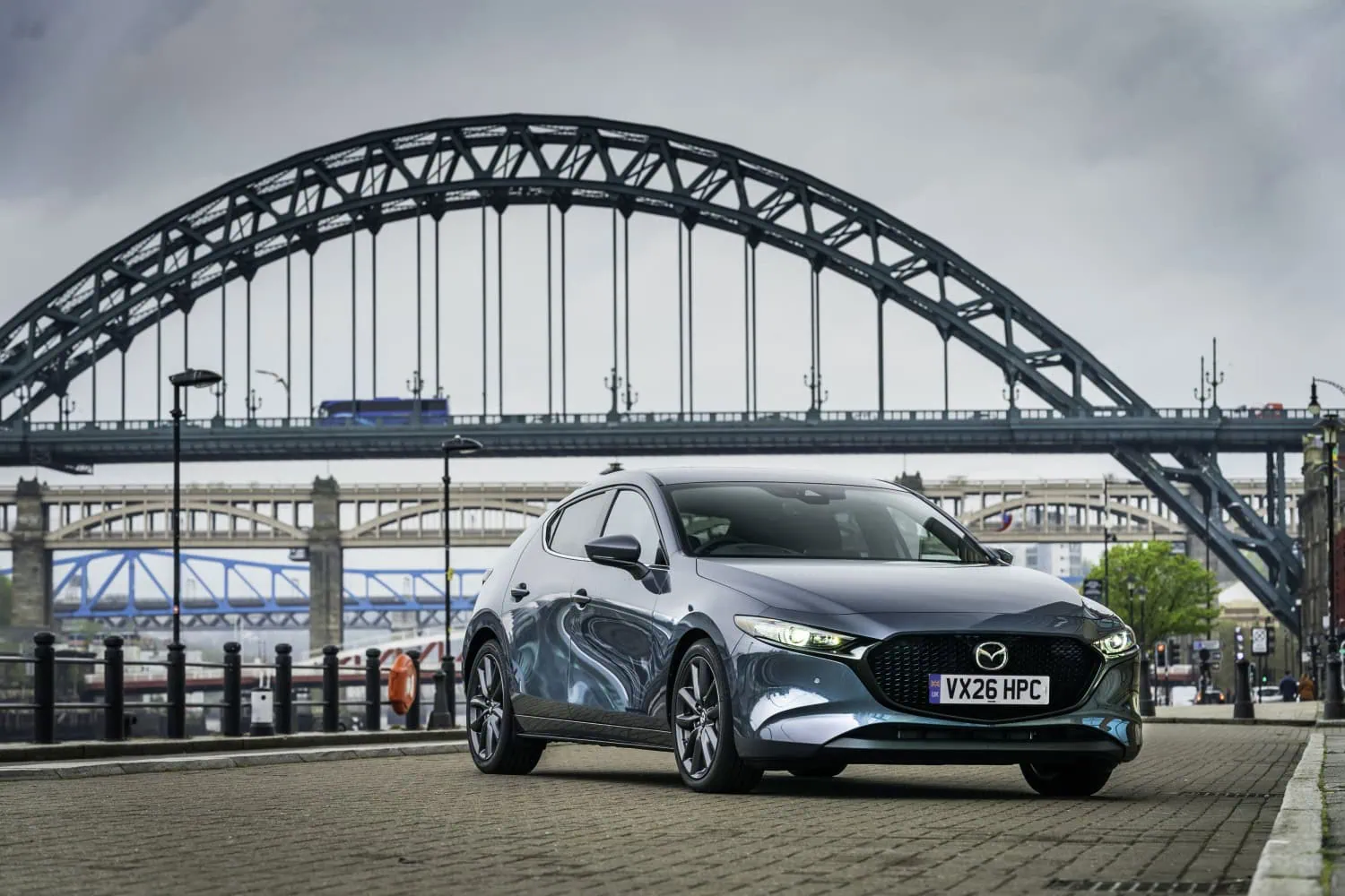 Grey Mazda3 by Tyne Bridge - Saffarazzi Mazda3 hatchback in grey by the Tyne Bridge.