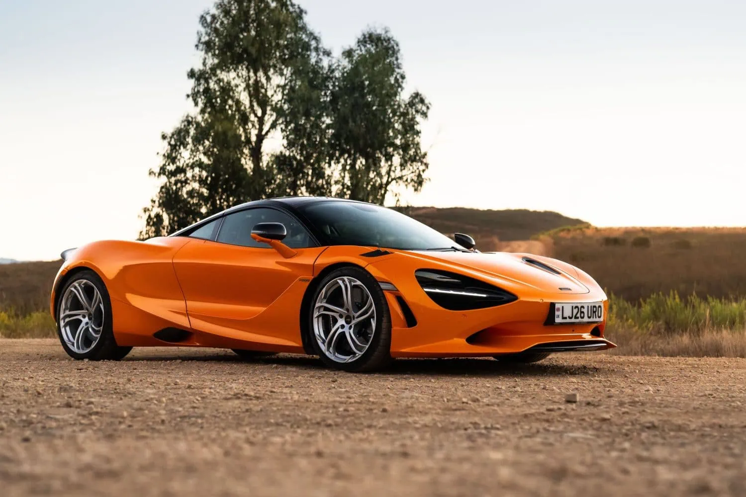 McLaren 750S supercar front three-quarter view on gravel - Saffarazzi McLaren 750S supercar front three-quarter view on gravel
