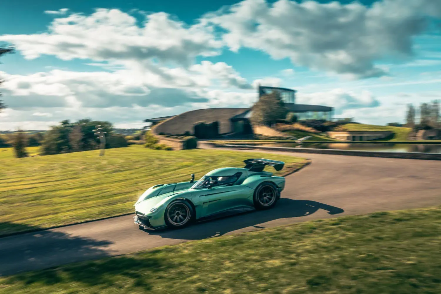 Spéirling PURE on the move - Saffarazzi McMurtry Spéirling PURE track car driving past headquarters.