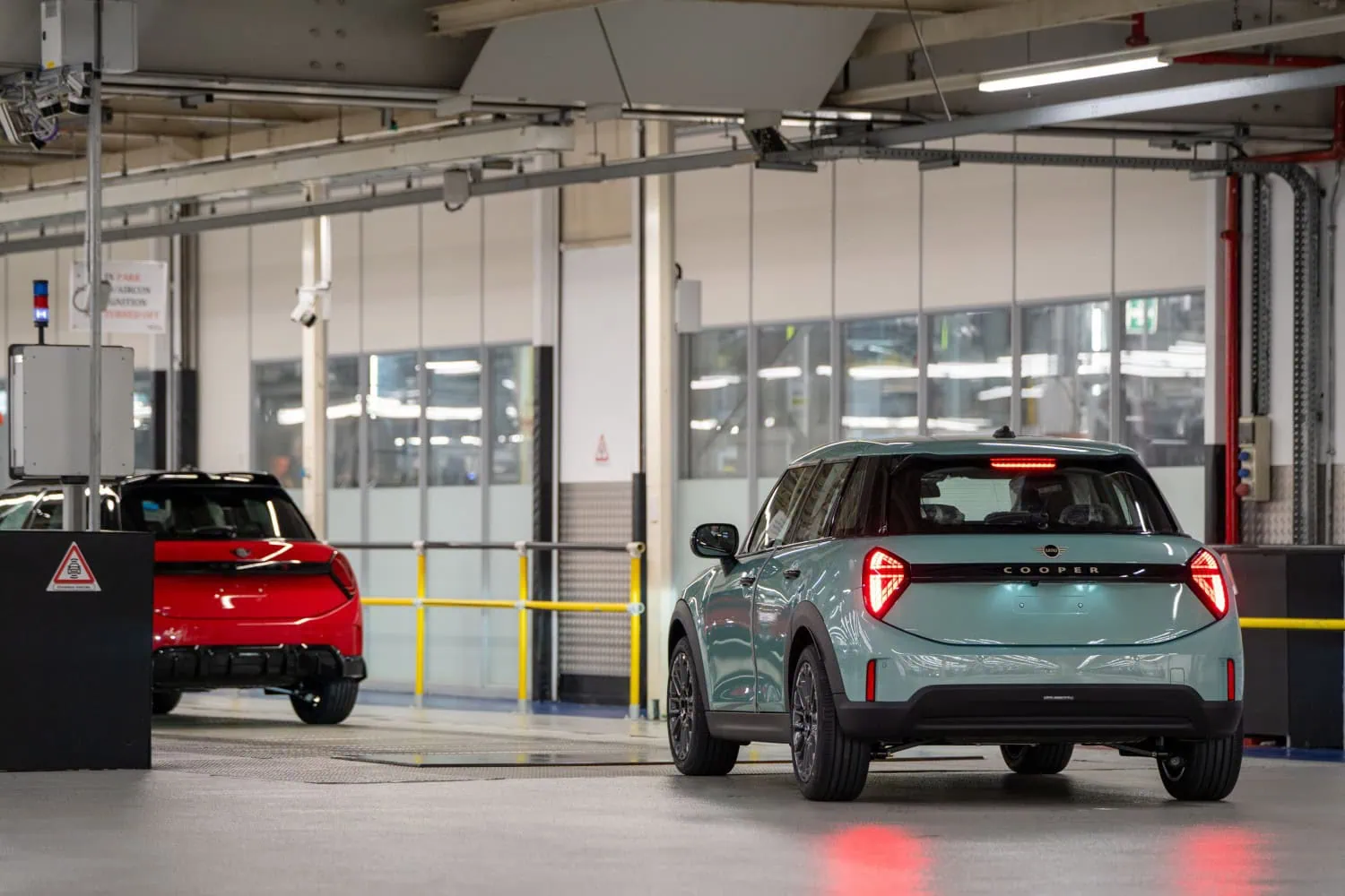 MINI Cooper rear view - Saffarazzi MINI Cooper five-door rear view inside plant hall.
