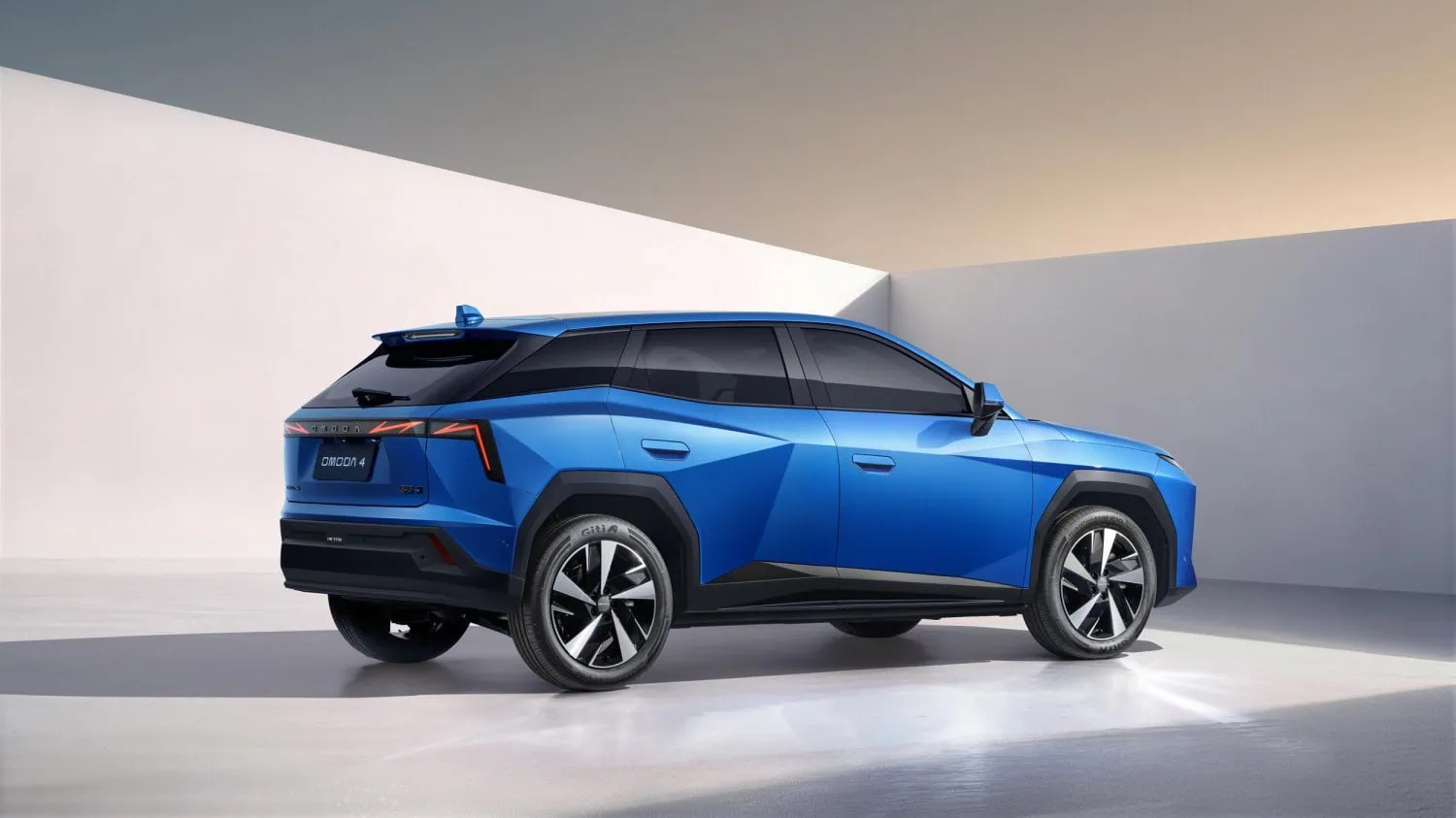 OMODA C4 rear left quarter - Saffarazzi OMODA C4 compact crossover rear left three-quarter view.
