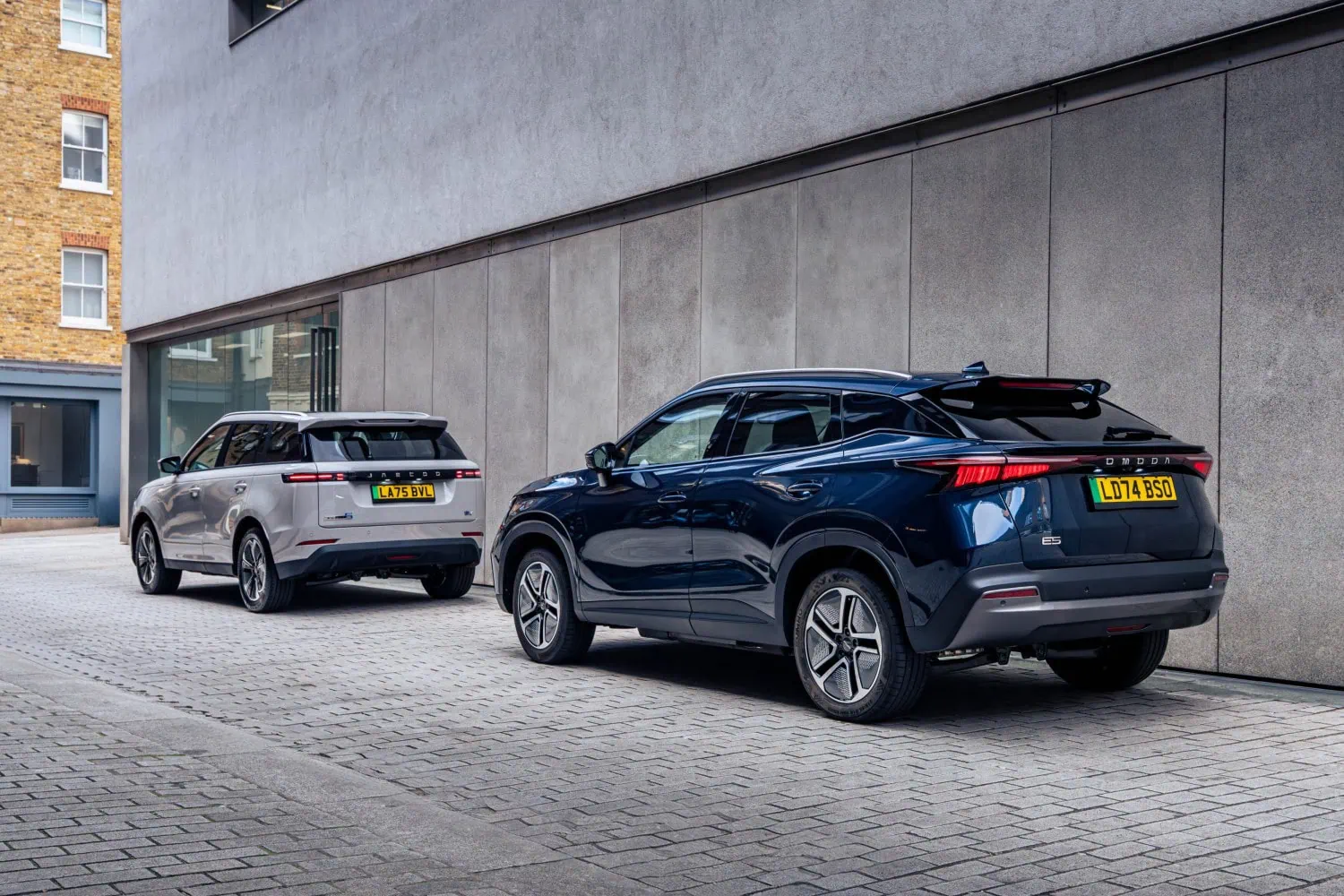 Omoda E5 rear on cobbles - Saffarazzi Omoda E5 and Jaecoo SUV rear three-quarter view.
