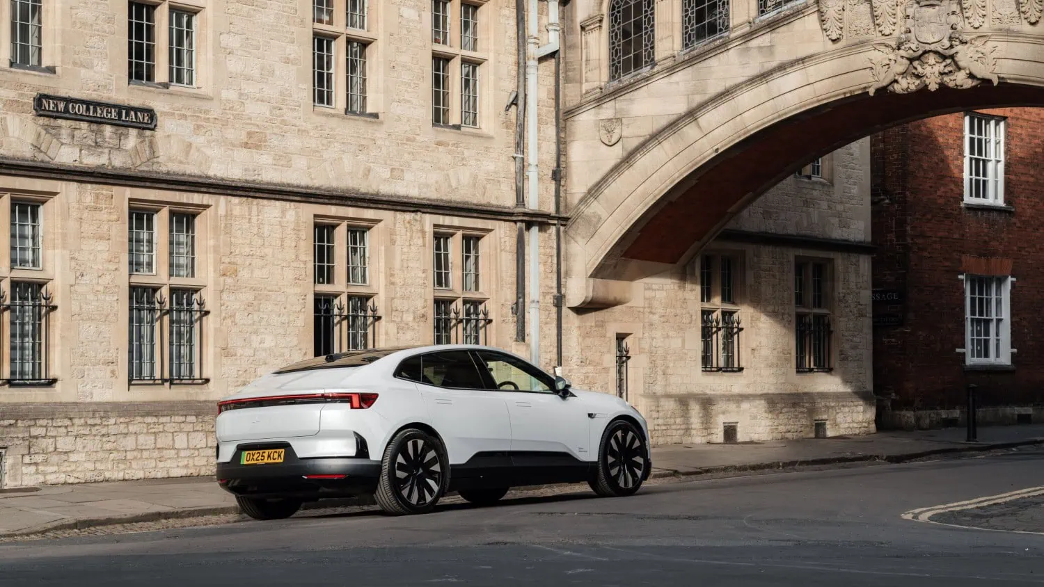 Polestar 4 on New College Lane - Saffarazzi Polestar 4 rear three-quarter view on New College Lane.