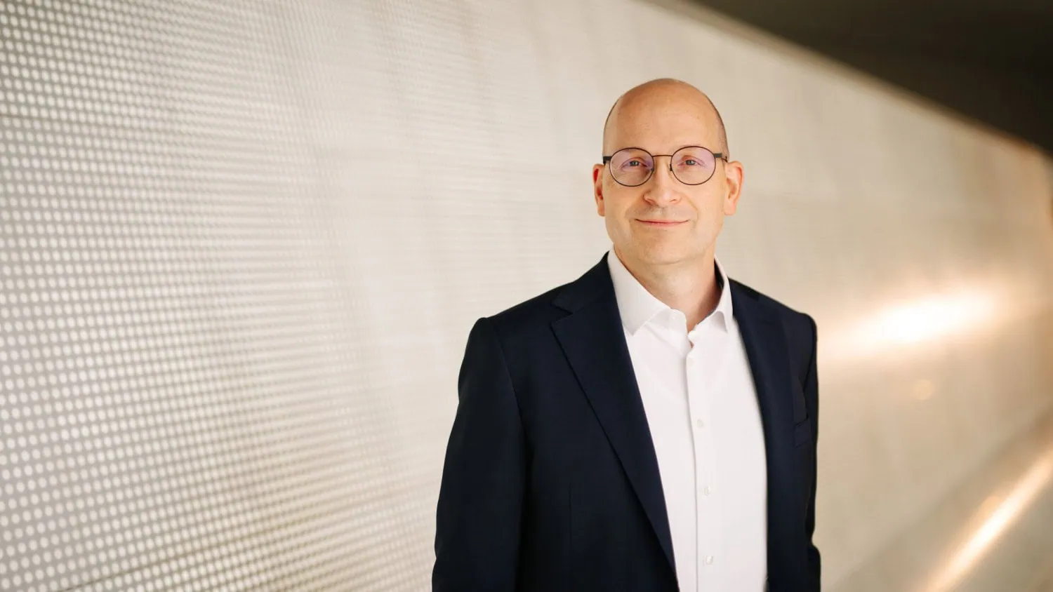 Executive with glasses portrait - Saffarazzi Porsche Technologies executive with glasses in portrait.
