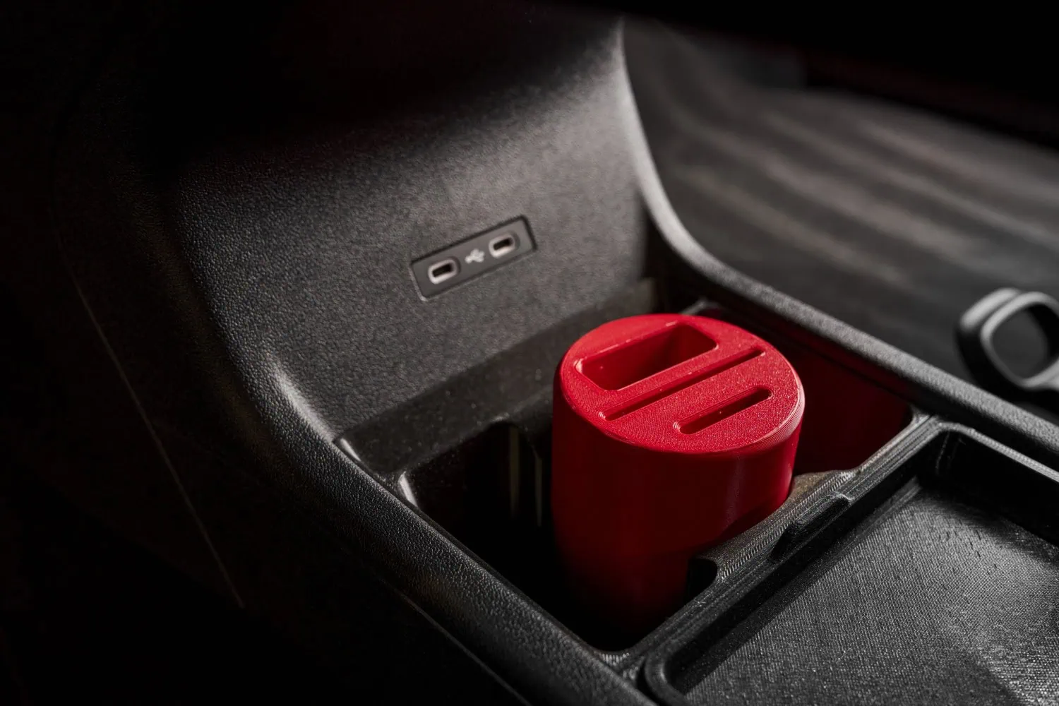 Red printed key holder - Saffarazzi Red 3D-printed Škoda key holder in cup holder.