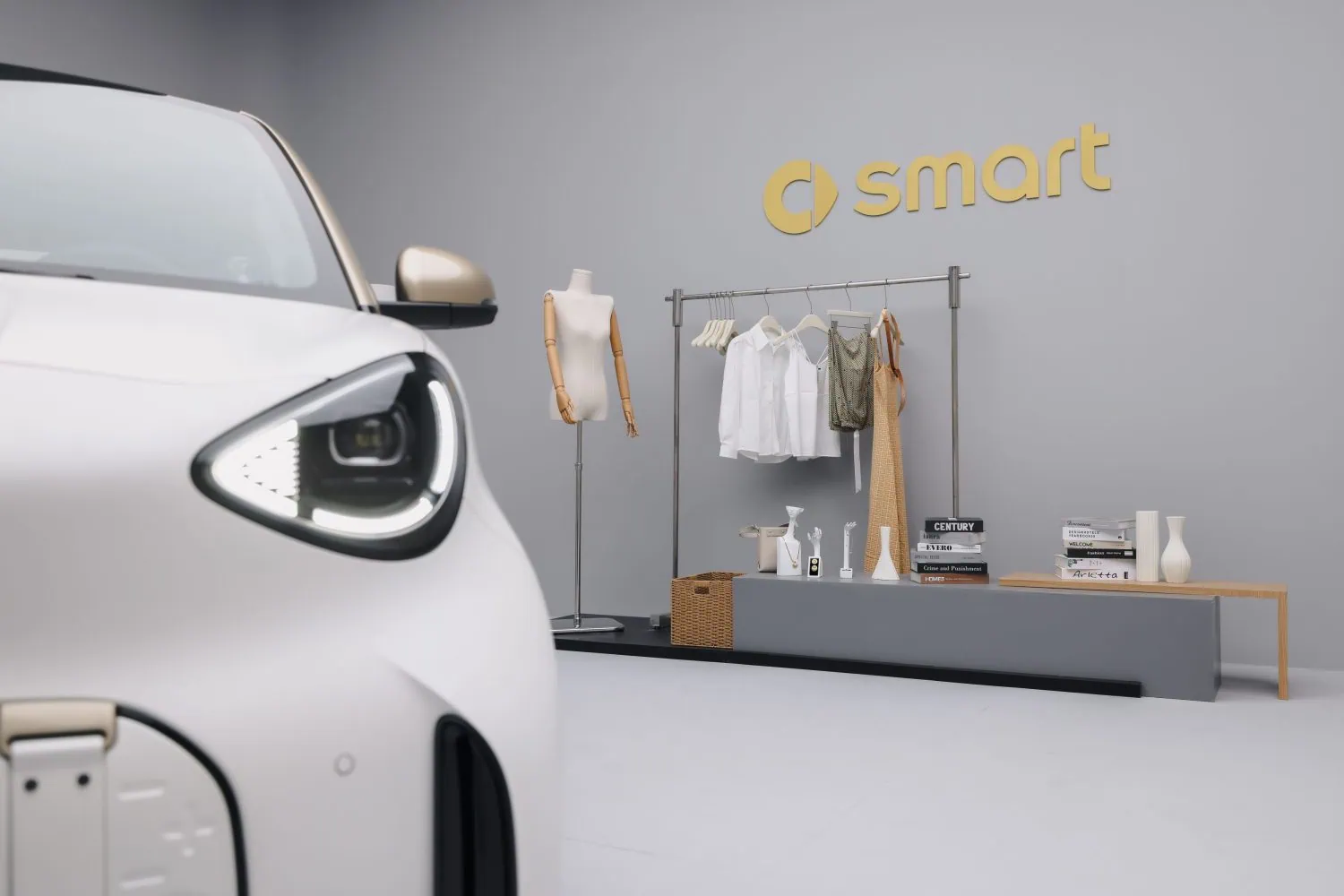smart #2 headlight with clothing rail display behind - Saffarazzi smart #2 headlight with clothing rail display behind